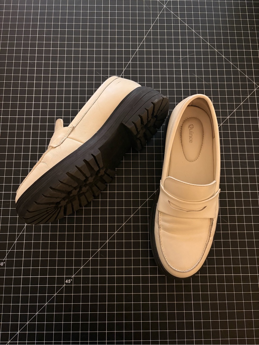 Quince Cream Penny Loafers with Black Lug Sole